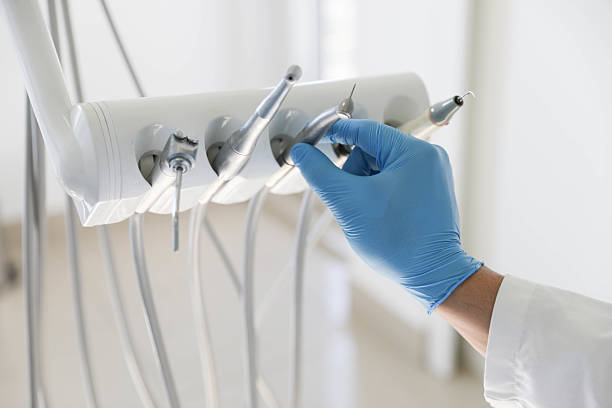 Professional Tooth Extraction technician working in San Joaquin, CA